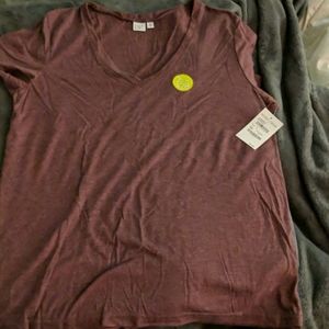 Dark purple v neck shirt size XL.